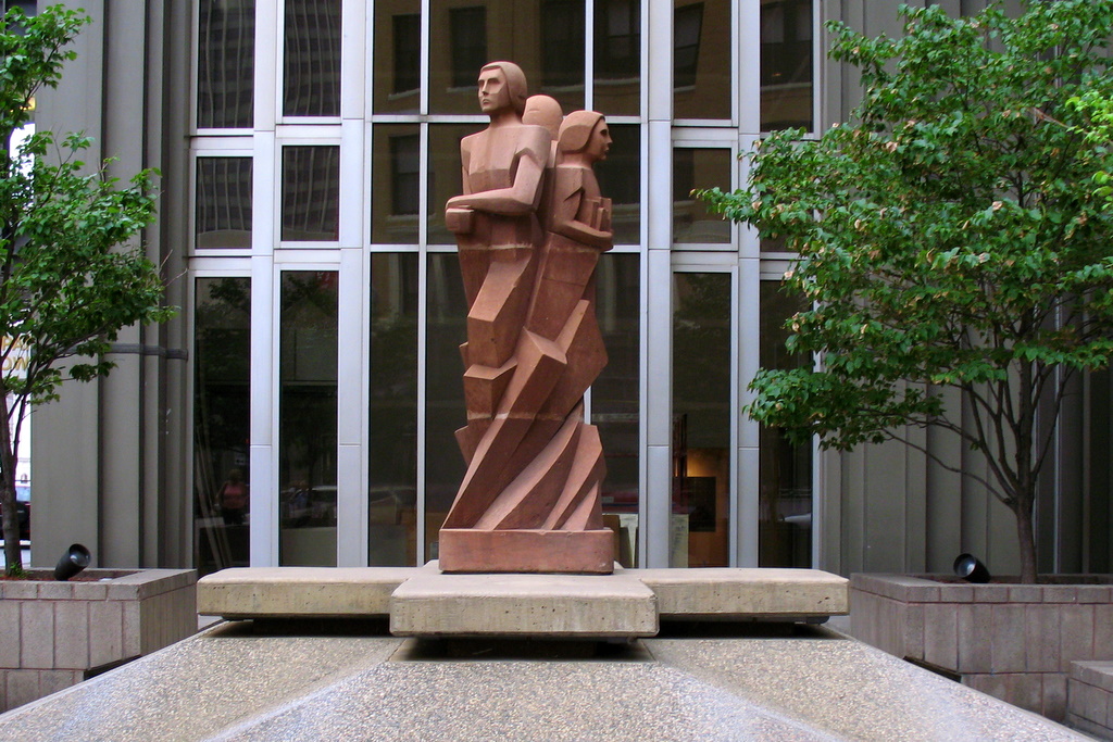 This sculpture stands at in front of the Amhoist Tower in downtown St Paul on 4th and St. Peter. It was dedicated on October 12, 1983, Estanislao Contreras was the sculptor, Juan M. Munguia was the designer.