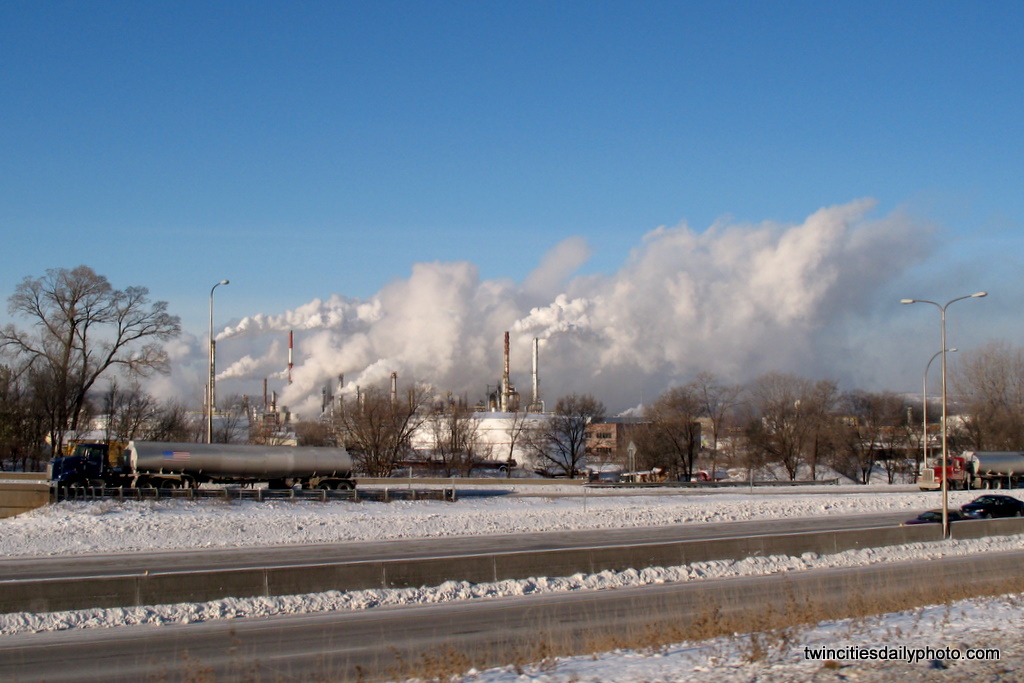 The Ashland Oil Refinery was throwing off steam everywhere making visibility of the refinery almost invisible.