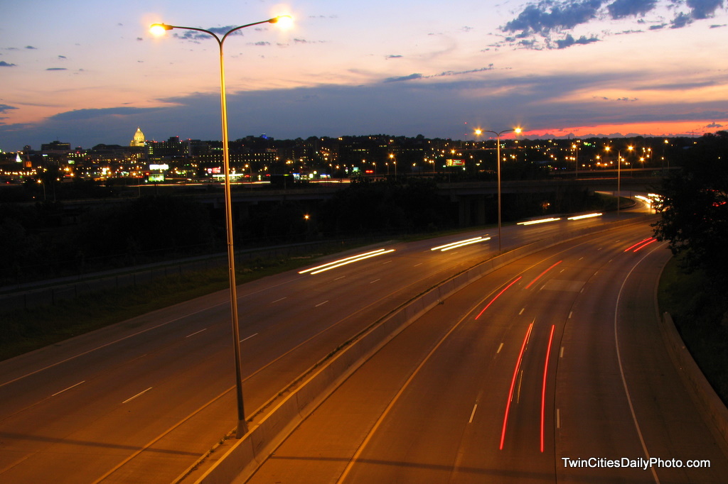 From an overpass from the EastSide neighborhood over Interstate 94. The sunset long gone. The State Capital building in the distance.