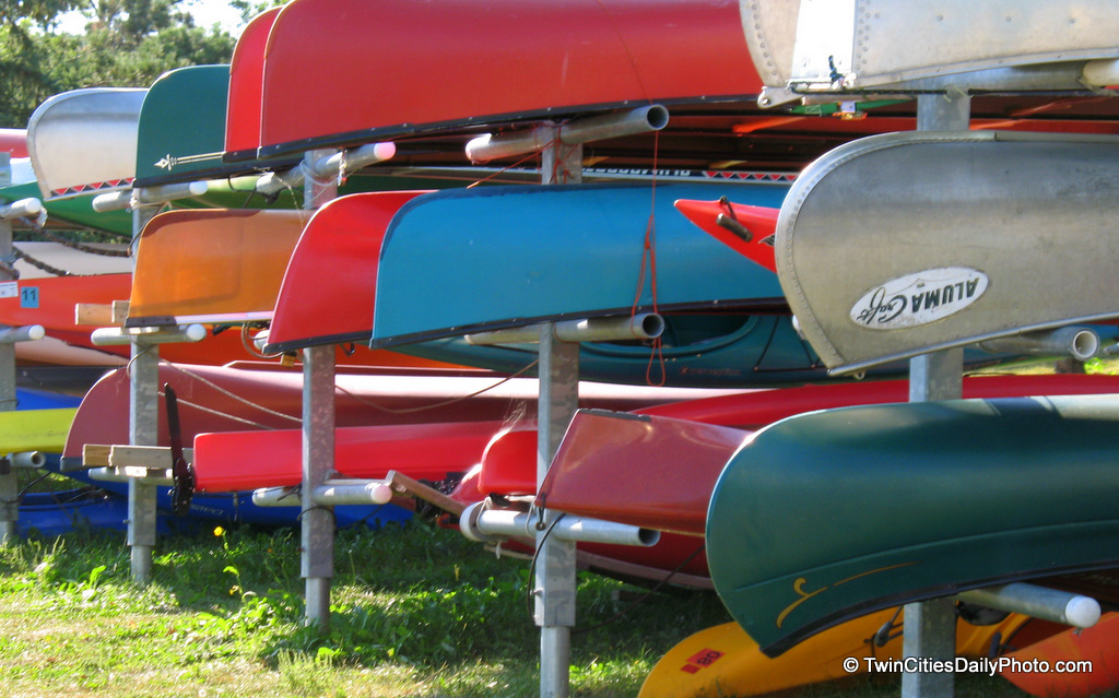 All sizes, shapes and colors of canoes at Lake Calhoun in Minneapolis.